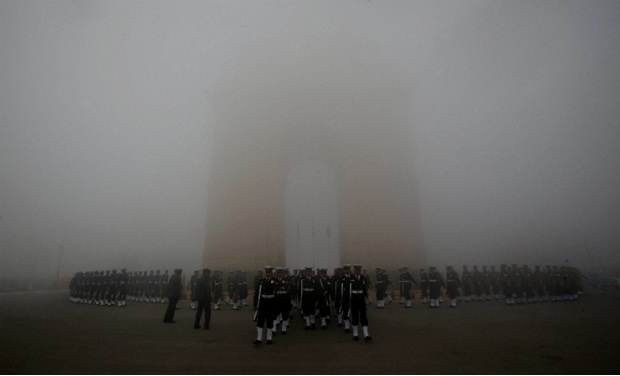 A blanket of fog covers the India Gate in New Delhi on Monday - PTI A blanket of fog covers the India Gate in New Delhi on Monday - PTI